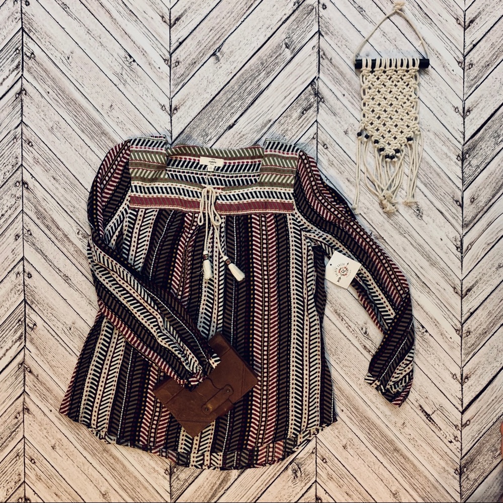 NEW Patterned blouse with tassels
